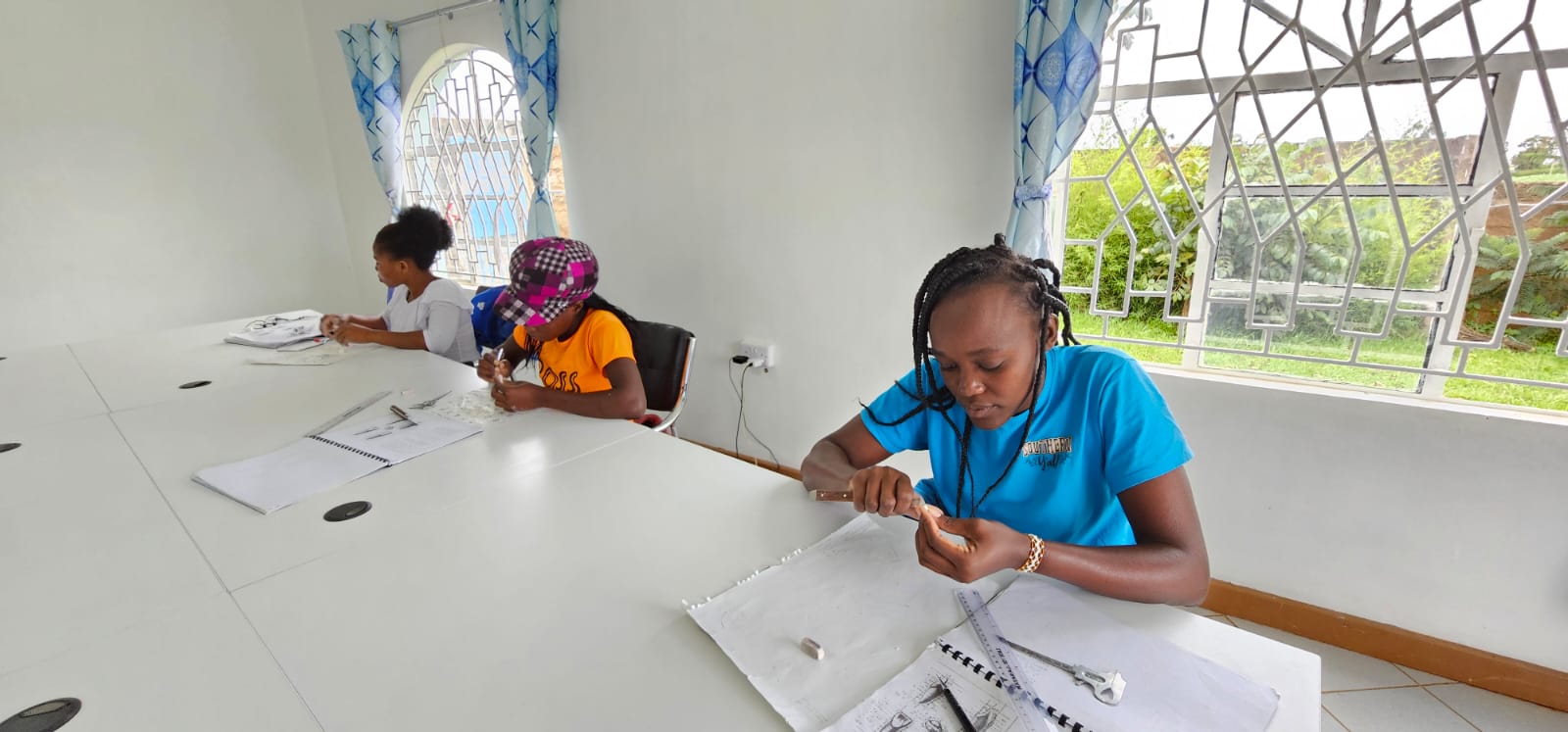 Students carving tooth models